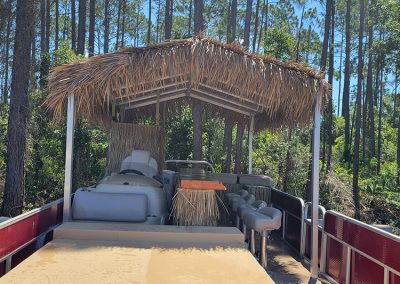 Front view of Alabama Tiki Pontoon party boat rentals in Orange Beach